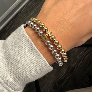 Tory Burch gold and silver beaded bracelets